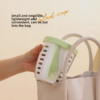Portable salad container with drain feature and matching fork.