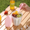 Practical salad container with a drain design, fork included.