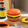 Fun and playful ceramic burger dipping bowl for sauces and dressings.