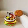 Creative burger storage stool for seating and organizing small items.