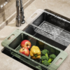 Multi-functional kitchen drain basket for washing and draining dishes and produce.