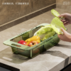 Collapsible dish rack and vegetable washing basket for kitchen space-saving.