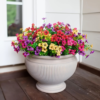 Decorative flower pot with assorted faux flowers for indoor and outdoor use