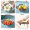 Expandable metal steamer with green handle