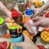 Easy-to-use straw caps for juice and soda cans