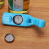 Push-type bottle opener with bottle cap inserted