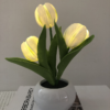 Close-up of LED tulip petals with warm lighting