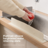 Silicone water retaining plate installed on kitchen sink edge to block water splashes during dishwashing