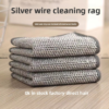 Stacked silver wire cleaning cloths for kitchen scrubbing and multi-surface cleaning
