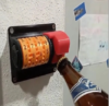 Wall-mounted bottle opener with built-in rotating counter tracking opened beer bottles